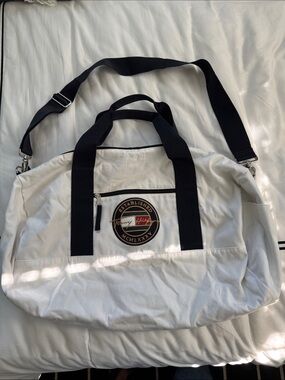 Tommy Hilfiger White Canvas Duffel with Black Straps and Signature Patch